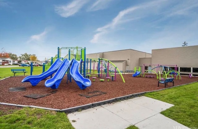 view of playground featuring a lawn