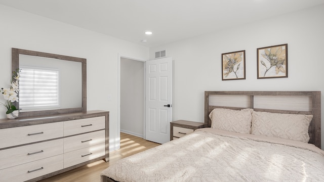 bedroom featuring light hardwood / wood-style flooring