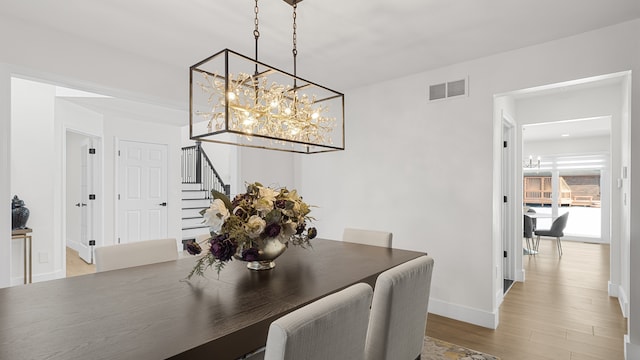 dining area featuring hardwood / wood-style floors