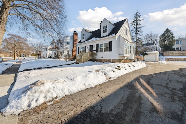 view of front of home featuring a chimney