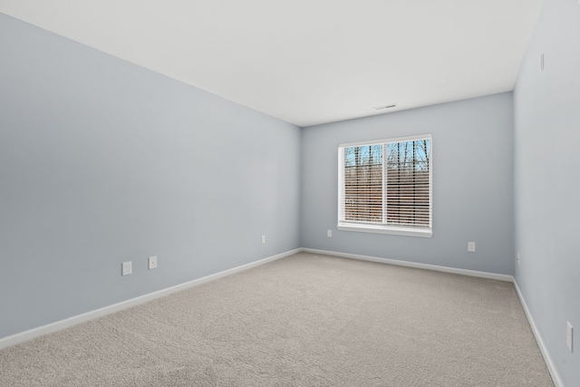 unfurnished room with carpet floors