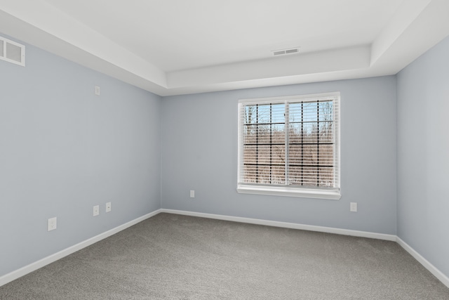 empty room featuring carpet floors