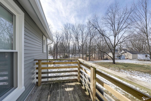 view of snow covered deck