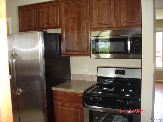 kitchen with appliances with stainless steel finishes