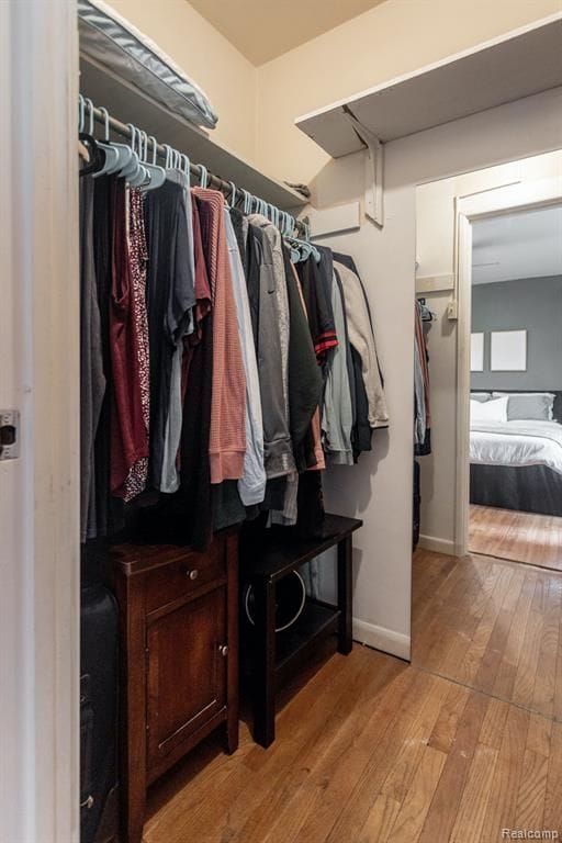 walk in closet featuring light wood-type flooring