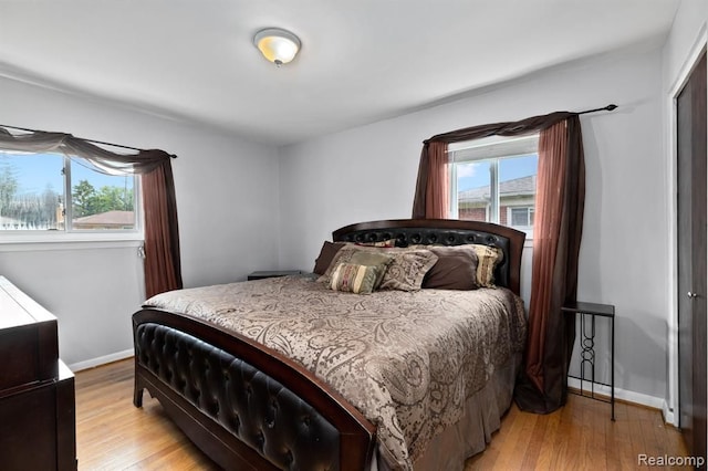 bedroom with light hardwood / wood-style flooring