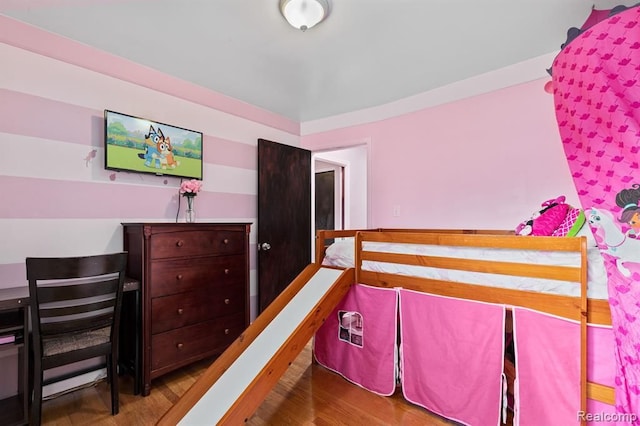 bedroom featuring hardwood / wood-style flooring