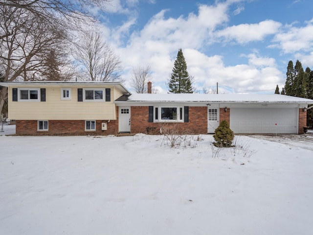 tri-level home featuring a garage