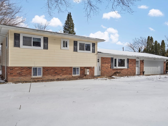 split level home featuring a garage