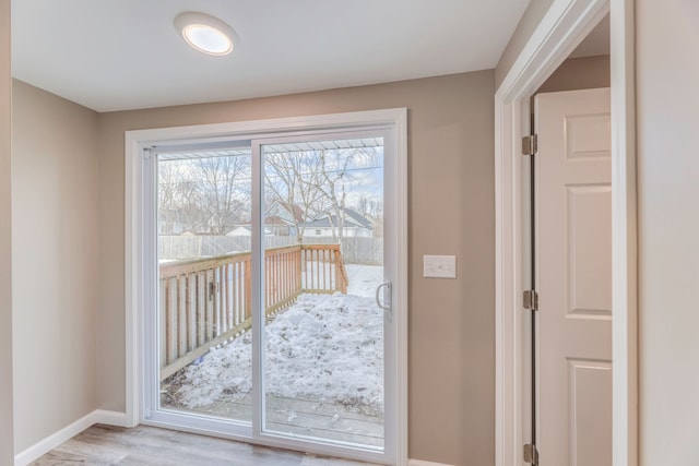 doorway featuring light hardwood / wood-style floors