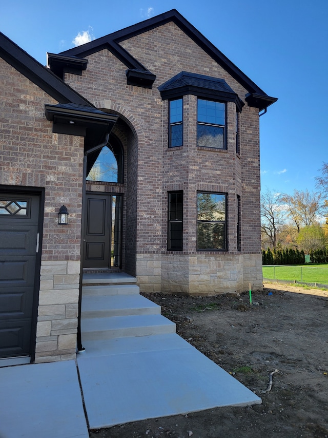 entrance to property featuring a garage