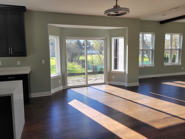 doorway to outside featuring dark hardwood / wood-style floors