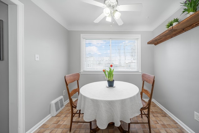 dining space featuring ceiling fan