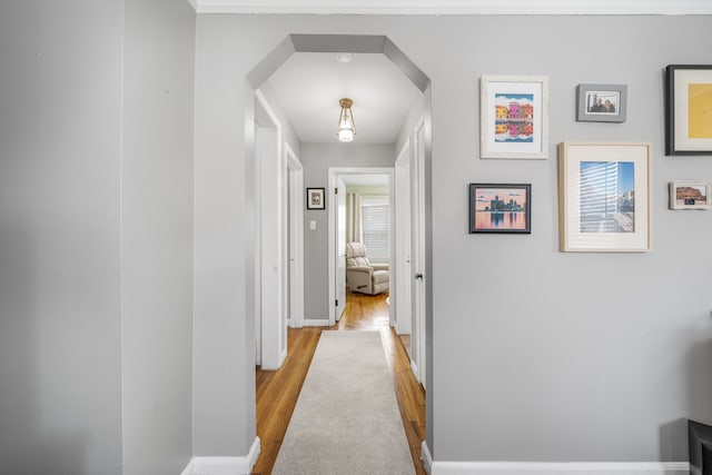 hallway with light wood-type flooring