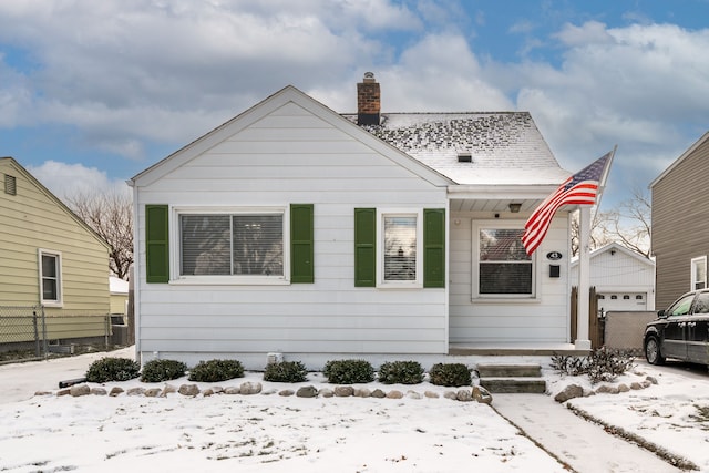 view of front of house featuring a garage and central air condition unit