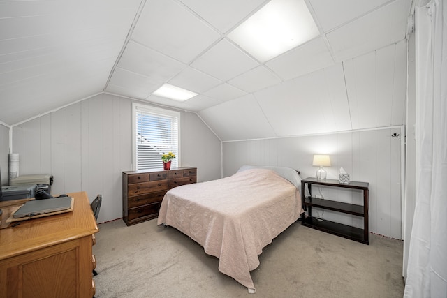 carpeted bedroom featuring vaulted ceiling