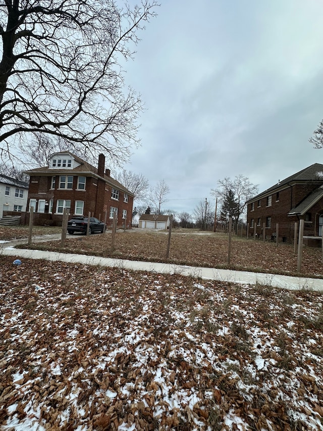 view of yard layered in snow