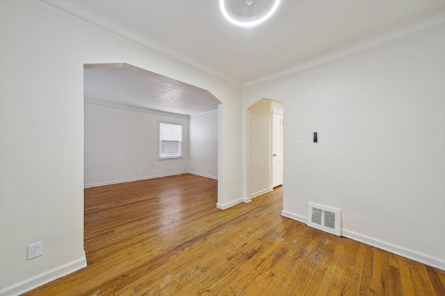 unfurnished room with light hardwood / wood-style floors