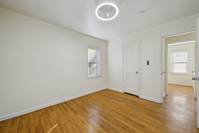 unfurnished bedroom with light hardwood / wood-style flooring