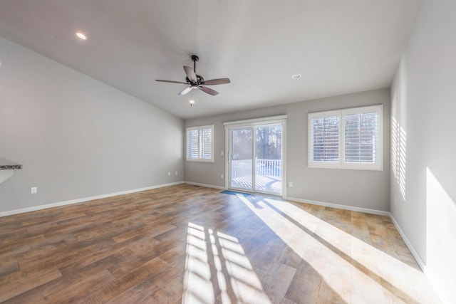 spare room featuring ceiling fan and light hardwood / wood-style floors