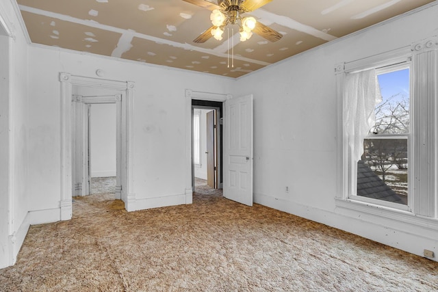 unfurnished bedroom featuring carpet and ceiling fan