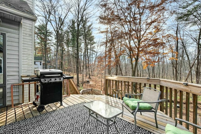 wooden deck with area for grilling