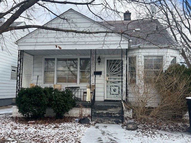 view of snow covered property entrance