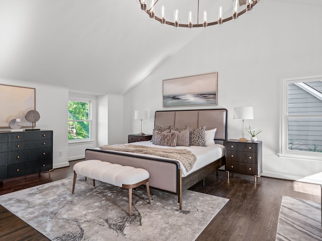 bedroom with lofted ceiling and dark hardwood / wood-style floors