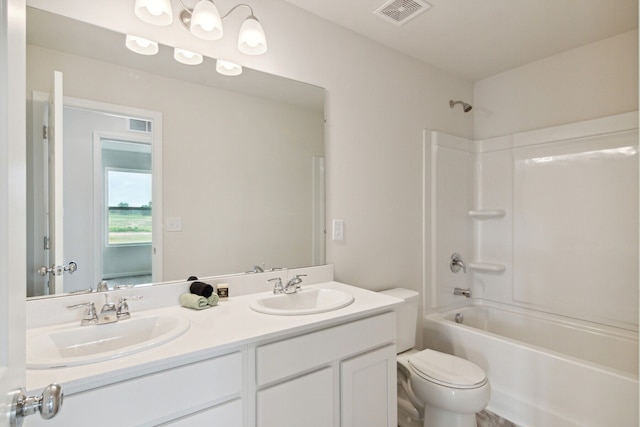 full bathroom with vanity, shower / washtub combination, and toilet