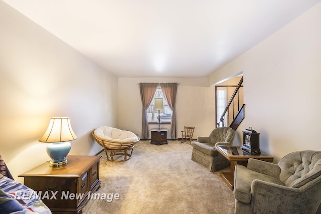 sitting room with light colored carpet