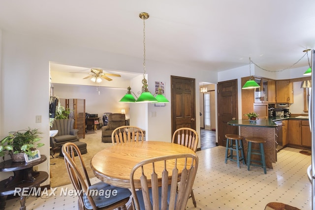 dining room with ceiling fan