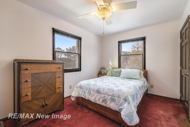 bedroom with dark carpet and ceiling fan