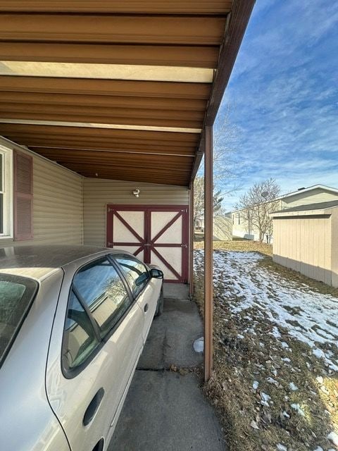 exterior space featuring a carport