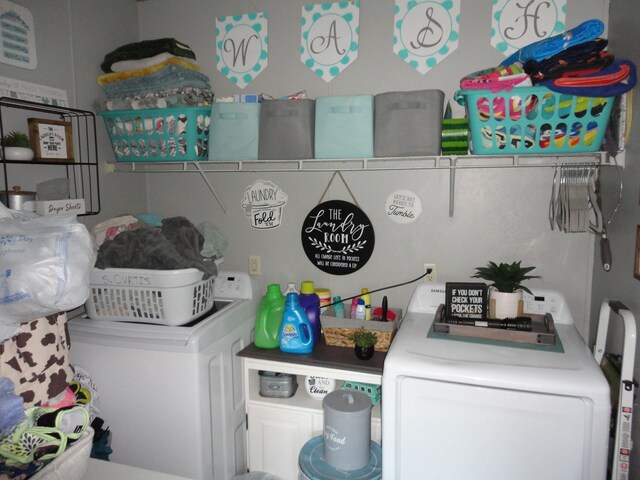 laundry room with washing machine and dryer