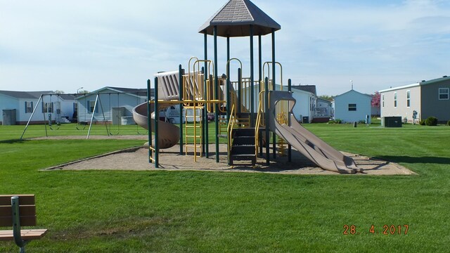 view of play area featuring a yard