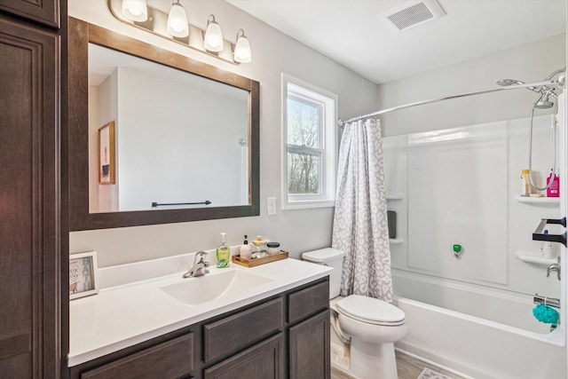 177 E Lowry, Brooklyn, MI 49230 - bathroom with vanity, shower / tub combo with curtain, and toilet