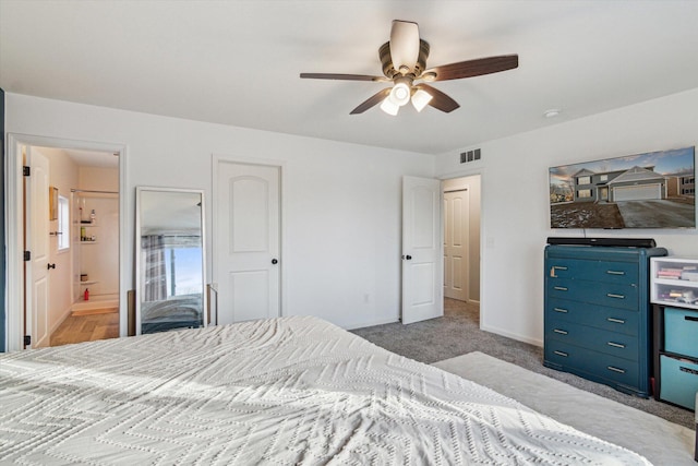 177 E Lowry, Brooklyn, MI 49230 - carpeted bedroom featuring ensuite bathroom, baseboards, and a ceiling fan