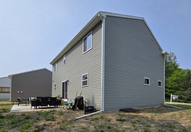 177 E Lowry, Brooklyn, MI 49230 - view of side of home featuring a patio