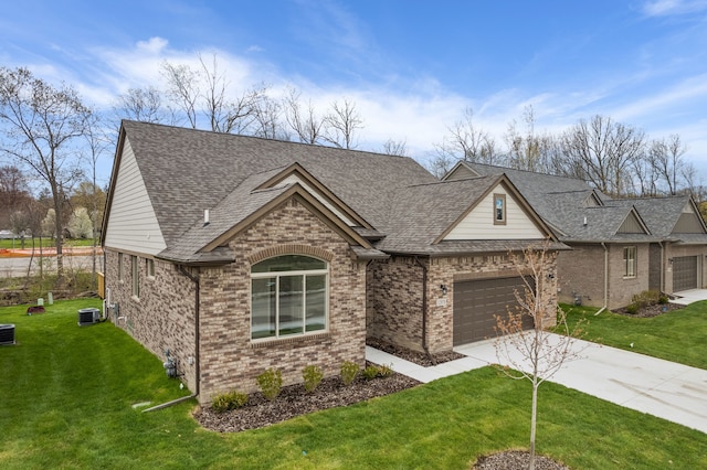 view of front of property featuring a front yard and central AC unit