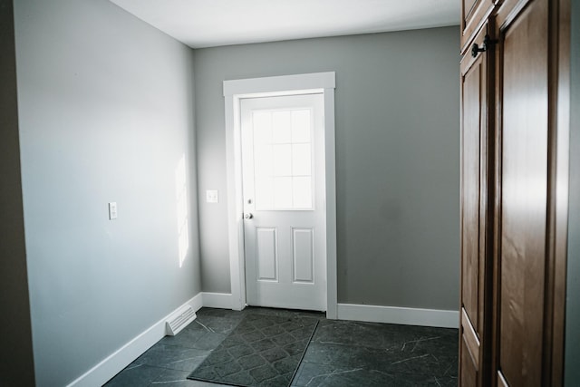 interior space with baseboards