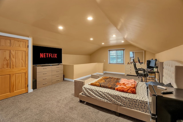 bedroom featuring carpet flooring and vaulted ceiling