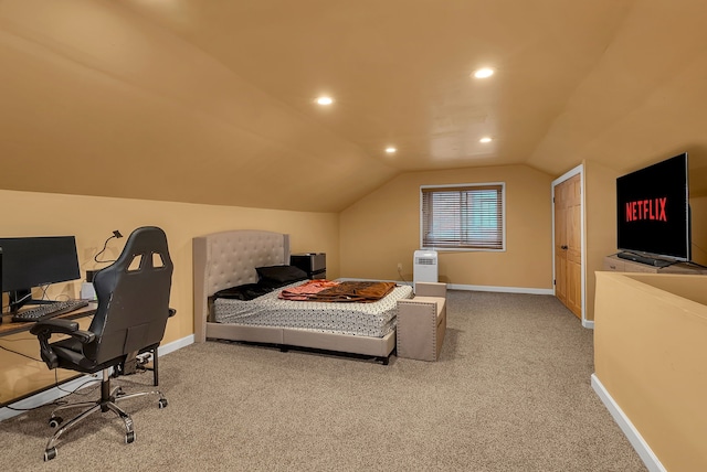 bedroom featuring vaulted ceiling and carpet flooring