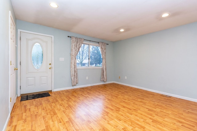 entrance foyer with light wood-type flooring