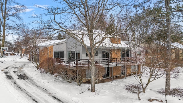 view of front of house with brick siding