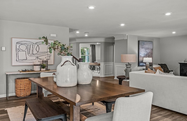 dining area with dark hardwood / wood-style flooring