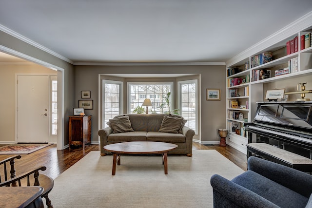 living room featuring ornamental molding and dark hardwood / wood-style flooring