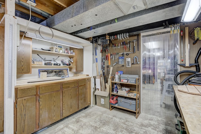 basement featuring a workshop area