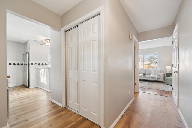 hallway featuring light hardwood / wood-style flooring