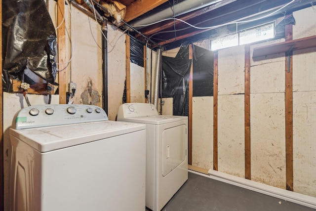 washroom with washing machine and dryer