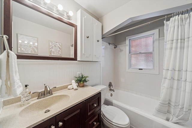 full bathroom featuring vanity, toilet, and shower / tub combo